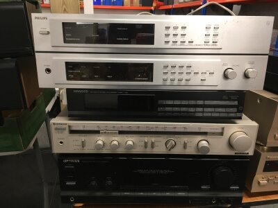 A collection of HiFi equipment comprising an Optimus SA2002 amplifier, a Philips stereo tuner V6100, Denon AVR 1803 etc.
