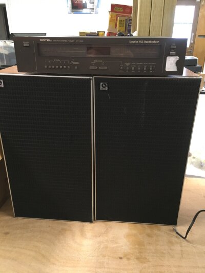 A pair of Leak 2030 speakers and a box of HiFi equipment including a Rotel RT 1010 tuner, a Marantz ST320L tuner and other items.