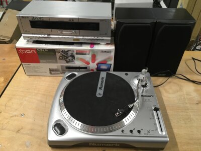 A Numark USB turntable, a boxed ion tape 2 PC cassette converter and a pair of Mission bookshelf speakers (4).