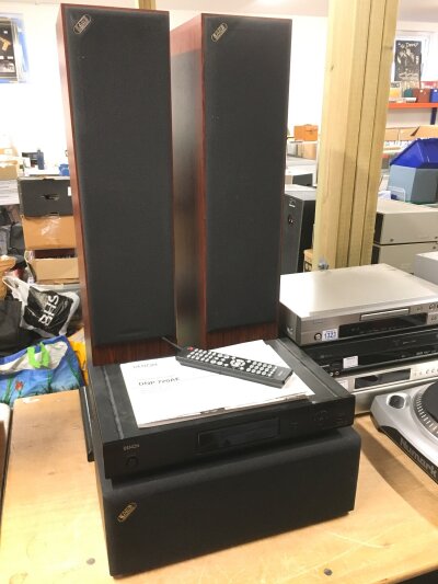 A Denon DNP-720AE network audio player with manual and remote control, a boxed Acoustic Energy 107C centre speaker and a boxed pair of Acoustic Energy AE109 tower speakers (4).