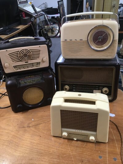 Five vintage radios comprising Ekco, Bush and other makers.