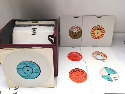 A record case of thirty collectable reggae and ska 7" singles, various labels including Coxsone, Duke Reid, Trojan, Bullet, Giant, Parma and others. Some rare.