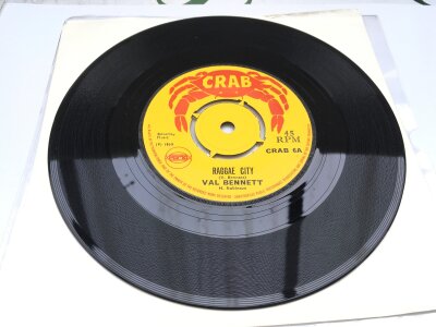 A rare UK reggae 7" single Raggae (sic) City b/w Mellow Trumpet by Val Bennett, 1969 Crab Records CRAB-6. Vinyl EX.