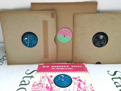 An Elvis Presley factory sample Girl Happy LP and three Elvis 78s (4).