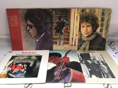 Six Bob Dylan LPs comprising Blonde On Blonde, Nashville Skyline, Blood On The Tracks and others.