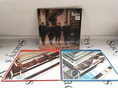 A sealed Beatles Live At The BBC 2LP set plus the red and blue double LP sets (3).
