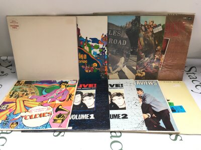 Ten Beatles LPs comprising a yellow vinyl Yellow Submarine, a white vinyl White Album, Abbey Road picture disc and others.