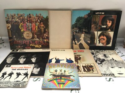 Eight Beatles LPs and two EPs including foreign pressings including Beatles 65, Let It Be and others.