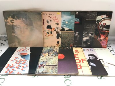 Eleven John Lennon and Paul McCartney/Wings LPs comprising Mind Games, Wild Life, McCartney and others.