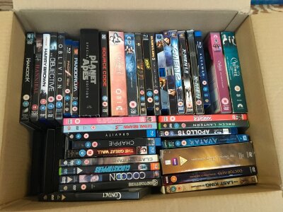 Four boxes of DVDs and BluRays.