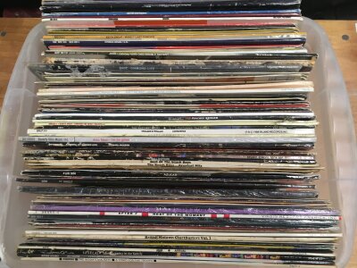 Two boxes of various LPs and 12" singles by various artists including The Style Council, Level 42, James Brown and many more.