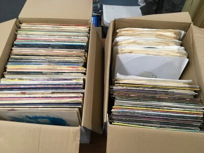 Two boxes of LPs and 12" singles including some dance music white labels.