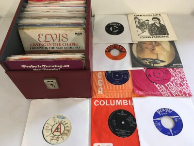 A record case of 7" singles by various artists from the 1960s onwards.