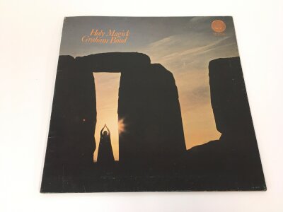 A first UK pressing of the Graham Bond LP Holy Magick, original 1970 gatefold sleeve with Vertigo swirl inner sleeve 6360 021. Vinyl EX.
