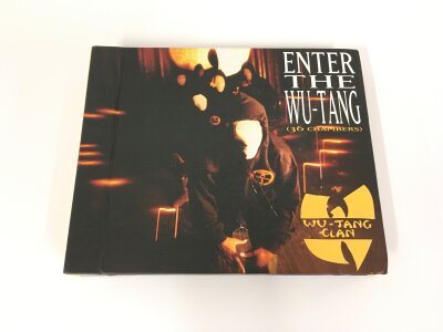 A Wu Tang Clan 6x7" singles box set Enter The Wu Tang (36 Chambers) on Get Down Records Get-56033-7 from 2016. Housed in a hard back casebook with a 56 page booklet.