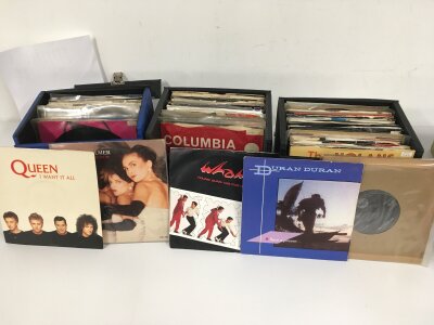 Twelve record cases of 7" singles by various artists comprising mainly 1980s titles.