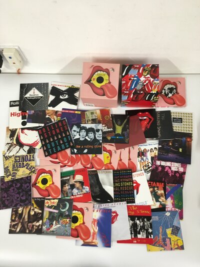 A limited edition and numbered Rolling Stones x45 CD box set of singles from 1971-2006 in NM condition. CDs are unplayed.