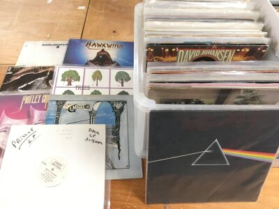 A box of LPs by various artists including a Prince white label, Pink Floyd, Hawkwind and others.