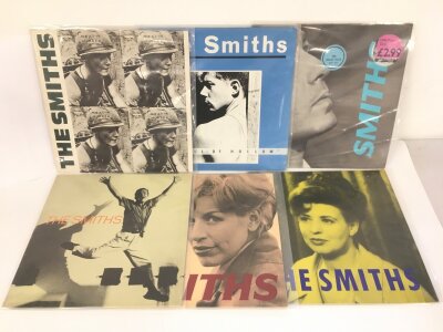 Two LPs and four 12" singles by The Smiths comprising Meat Is Murder, Hatful Of Hollow, Panic and others.