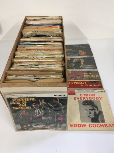 A collection of mainly rock n roll 7" singles and EPs by various artists including Elvis Presley, Gene Vincent, Eddie Cochran, Billy Fury and others. Also includes a red label Please Please Me 7" single, sadly scratched.