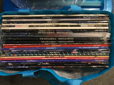 A collection of Now and Hits compilation LPs.