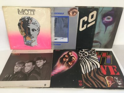 Eight rock LPs by various artists including Uriah Heep, Deep Purple, a Rush promo disc and others,