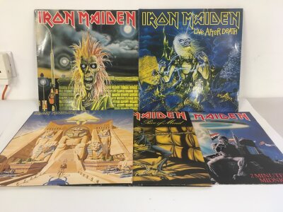 Four Iron Maiden LPs and a 12" single comprising Piece Of Mind, Live After Death and others.