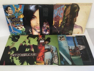 Two bags containing 21 rock and pop LPs by various artists including David Bowie, Prince, The Psychedelic Furs and others.