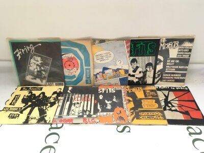 Twenty punk 7" singles and EPs by various artists including UK Subs, The Saints, Firing and others.