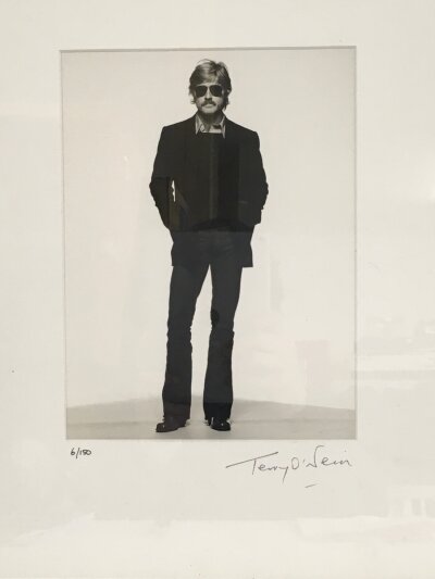 Terry O'Neill CBE 1938-2019. A framed and glazed limited edition gelatin silver print of Robert Redford signed and numbered by Terry O'Neill to the mount, 6/150. Approx size including frame 38cm x 46cm.