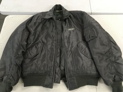 A James Bond The World Is Not Enough crew jacket, size XL.