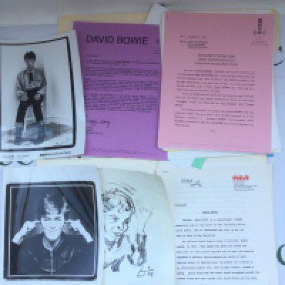 A collection of David Bowie press packs and related ephemera including 'Heroes' and 'Lodger' era items.