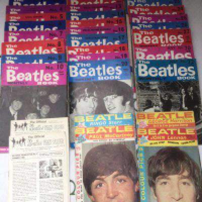 A collection of Beatles related ephemera comprising Beatles Book Monthly magazines numbered 1-27 plus issues 70 and 72, two fan club newsletters, an April 1964 reprint of In His Own Write, A+BC cards (glued in pages), various postcards and newspaper articles and four scrapbooks.