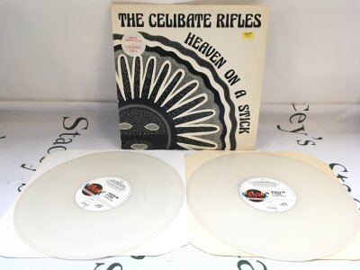 An opaque white vinyl Heaven On A Stick double LP by The Celibate Rifles. Vinyl EX.