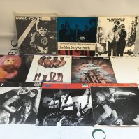 Ten Sub Pop 7" singles by various artists including Sonic Youth, Dinosaur Jr, Tad and others.