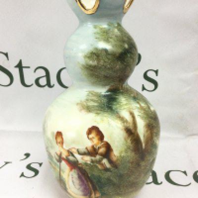 A 19th Century vase with hand painted decoration of figures in a countryside setting, approx height 26.5cm. Shipping category D. NO RESERVE