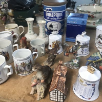 A collection of ceramics including commemorative bells animals figures and Belleek vases . NO RESERVE