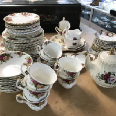 Royal Albert country roses tea set and some other pieces including Colclough. This lot cannot be posted