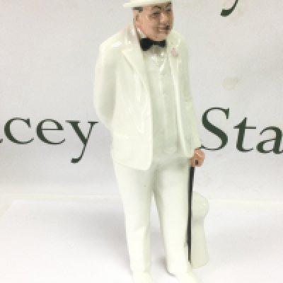 A Royal Doulton figure of Winston Churchill, approx height 26cm. Shipping category D.