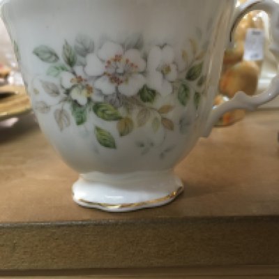 A Boxed Royal Albert Haworth tea set . Six cups saucers side plates ,