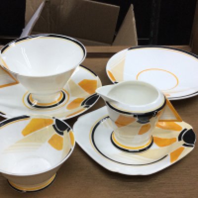 A Shelley tea cup, two saucers, sugar bowl, cream jug and side plate