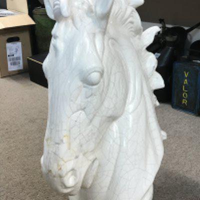 A ceramic horse head sculpture, possibly Italian. with some damage .67cm tall . This lot cannot be posted