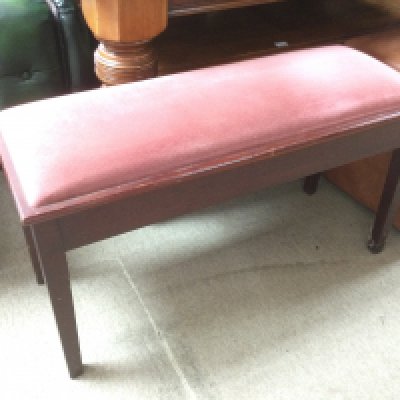 A duet piano stool. Shipping category D.