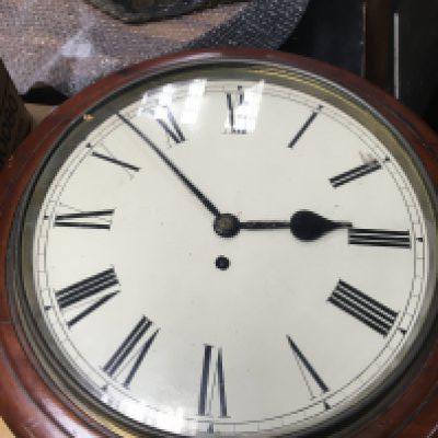 A Mahogany drop dial wall clock the painted dial with Roman numerals Fitted with a fusee dial.