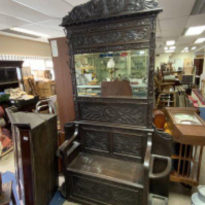 a large Victorian oak hall stand/seat with mirrored back. 218cm x 131