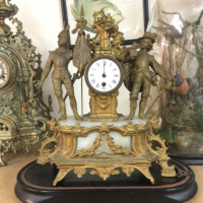 A French splitter clock without glass dome. 49cm tall by 47cm wide. Postage D