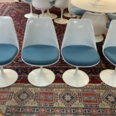 6 Tulip chairs designed by Eero Saarinen 1956 (Finnish-American, 1910-1961) for Knoll Studio 1956, 4 with cushions/ 2 without cushions / 2 107cm Diameter table tops without bases.