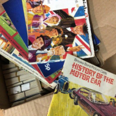 A box containing cigarette cards various including History of The Motor Car. NO RESERVE