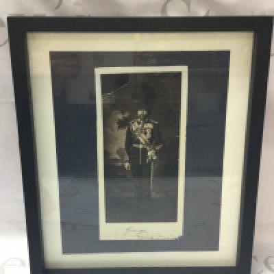 Royal Interest ,a framed signed King George V Photograph in military uniform, inscribed George, Sydney , June 3rd. From the family archive of Lord Stamfordham, Private secretary to Queen Victoria and later King George V . Postage catB