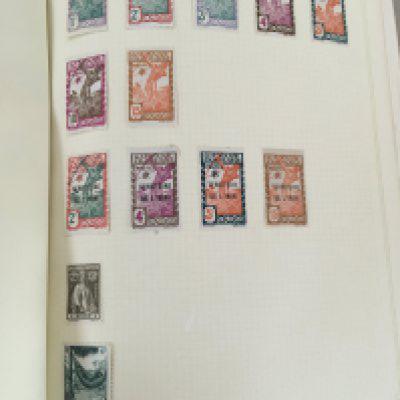 Eight Albums containing world stamps including 19th century used and unused some in sleeves stamps French Colonial, Morocco India Germany An Album of Great British Stamps manly Elizabeth II
